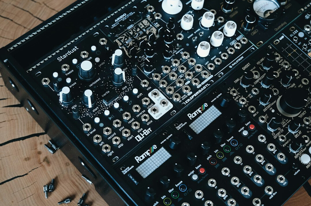 Studio floor with cables, stands and equipment cases being set up